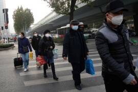 President Xi says Covid control is entering &lsquo;new phase&rsquo; as cases surge after reopening