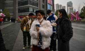 China reports nearly 13,000 Covid deaths over last week