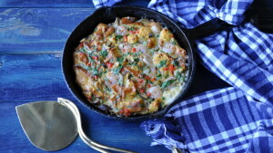 Take your breakfast up a notch with this savoury bread pudding-spicy omelette recipe