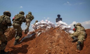 Clashes in Kurdish-held Syrian area kill 13 fighters