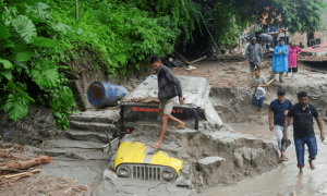India flood toll hits 56, army warns on stray munitions