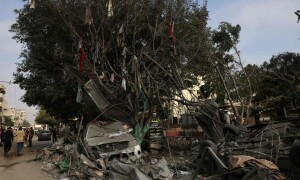 PHOTOS: Buildings, cars, trees in Gaza charred after overnight Israeli heavy bombing