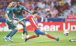 Atletico fight back to beat Cadiz with Correa brace