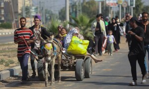 Gaza evacuees continue to move through Rafah crossing after re-opening