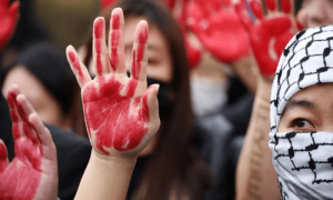 PHOTOS: Pro-Palestinian protesters gather outside Foreign Ministry in Seoul