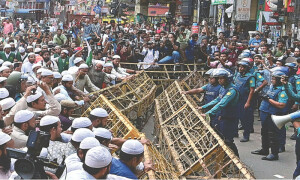 Bangladesh sets election for Jan 7 amid violent protests