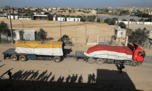 Aid trucks enter Gaza from Egypt after temporary truce begins