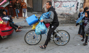 PHOTOS: Gazans fill streets heading home as 4-day truce begins