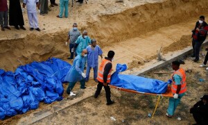 Truce allows Palestinians in Gaza to visit graves of relatives killed by Israel