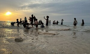 PHOTOS: Palestinians flock to beach for momentary respite amid temporary truce