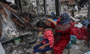 PHOTOS: Gazans dismally continue daily lives amidst rubble of homes