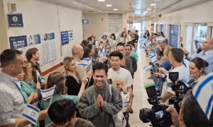 Thai foreign minister fights back tears, welcomes Hamas release of Thai workers