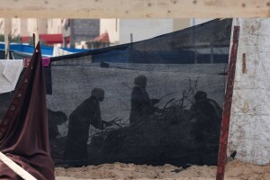 PHOTOS: Displaced Palestinians flee Gaza as Israel continues bombardment