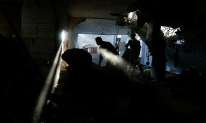 PHOTOS: Palestinians search for casualties in Rafah after Israeli strikes