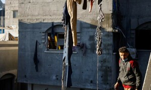 PHOTOS: Palestinians left beleaguered after Israeli airstrikes