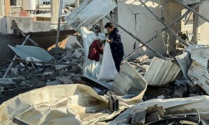 PHOTOS: Palestinians in Khan Younis collect belongings from rubble after Israeli strikes