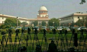 India&rsquo;s top court upholds end of special status for held Kashmir, orders polls
