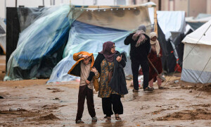 Heavy rain hits Gaza as evacuees try to find winter clothes