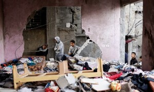PHOTOS: Palestinians inspect damage as Israeli bombardment continues