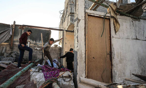 PHOTOS: Palestinians search the rubble following Israeli bombardment in Rafah