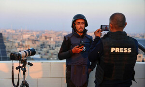 PHOTOS: Palestinian journalists use mobile phones, eSIMs to broadcast live amid power cuts