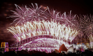 In pictures: World welcomes 2024 with fireworks, reflection and a royal farewell