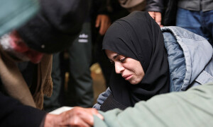 PHOTOS: Palestinians mourn the death of loved ones following Israeli strikes