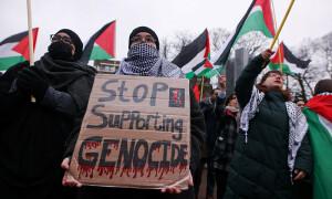 Activists outside debunk Israel&rsquo;s claims at the ICJ