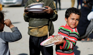 PHOTOS: Displaced Palestinians shelter in a tent camp in Rafah