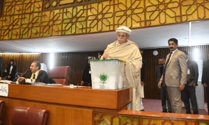 Presidential candidate Mahmood Achakzai casts his vote