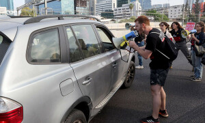 PHOTOS: Relatives of Israeli hostages block Tel Aviv highway, call for their release