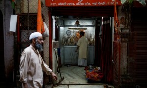 Delhi voters, scarred by Hindu-Muslim riots, want peace