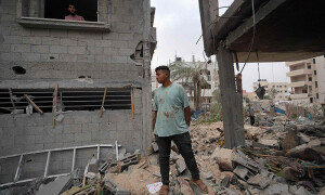 PHOTOS: Palestinians grieve after an Israeli strike on Central Gaza