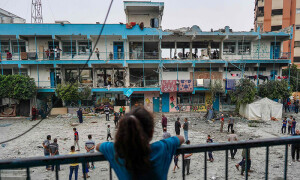PHOTOS: Palestinians inspect the remains of UNRWA school in Gaza hit by Israeli airstrike