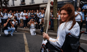 Lebanese journalist wounded in Israeli strike carries Olympic torch in Paris