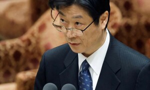 Bank of Japan plays down chance of near-term rate hike, yen slumps