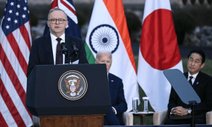 China &lsquo;testing us&rsquo;, says Biden in hot mic remarks to Quad allies