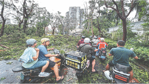 Monstrous typhoon tears through Philippines  and China, kills 22