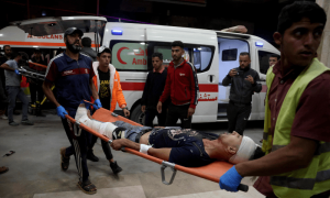 Israeli fire kills 30 Palestinians, as tanks roll into Gaza camp