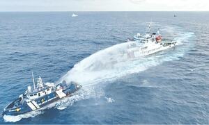 China accused of firing water cannon on Philippines vessel