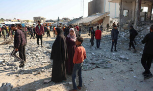 PHOTOS: Palestinians inspect the aftermath of an Israeli strike in Gaza&rsquo;s Khan Younis