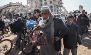 Exhausted Palestinians arrive in Gaza City to destroyed homes, dead family