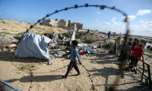 PHOTOS: Aftermath of Israeli strike on tent camp in Gaza&rsquo;s Khan Younis