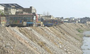 Illegal parking, dumping of construction waste further shrink Leh Nullah