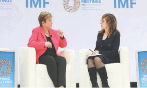 IMF sees global growth hurt by trade tensions