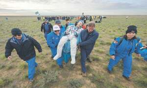 Nasa’s oldest active astronaut returns to Earth