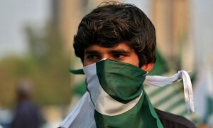 Twin cities’ residents rally behind armed forces as daily life continues uninterrupted