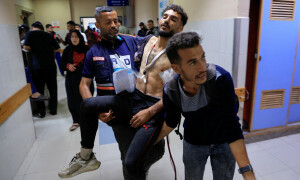 Israeli gunfire kills 10, wounds over 100 near aid site: Gaza rescuers
