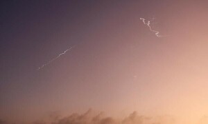 PHOTOS: Missiles launched from Iran towards Israel seen from occupied West Bank
