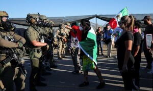 US officials defend immigration raid tactics